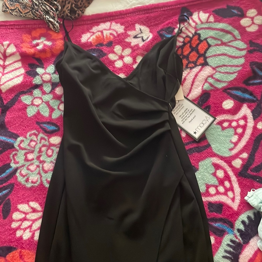 classy macys long black dress. flattering slit ☺️